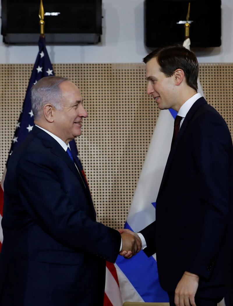 Israeli Prime Minister Benjamin Netanyahu shakes hands with White House adviser Jared Kushner as they meet in Warsaw, Poland, February 14, 2019. REUTERS/Kacper Pempel