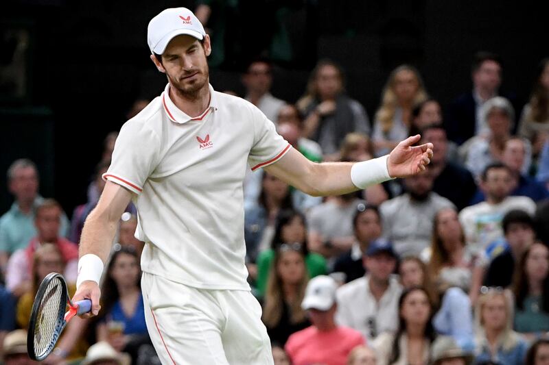 Andy Murray struggles against Denis Shapovalov of Canada.