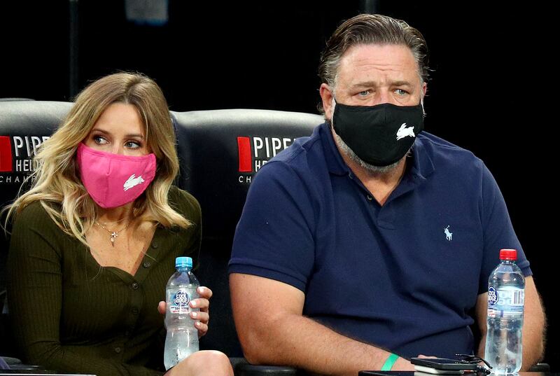 Russell Crowe wears a face mask as he watches the Australian Open women’s singles final in Melbourne. AFP