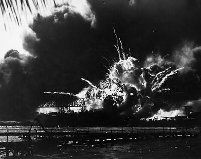 07 Dec 1941, Honolulu, Oahu, Hawaii, USA --- Smoke and flames make a spectacular sight as the USS Shaw explodes during the Japanese attack on Pearl Harbor.  December 7, 1941. --- Image by © CORBIS