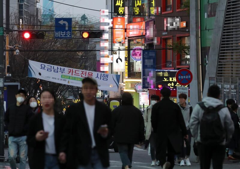 Hongdae, an area of western Seoul popular for its vibrant, youthful atmosphere, South Korea, 10 April. EPA