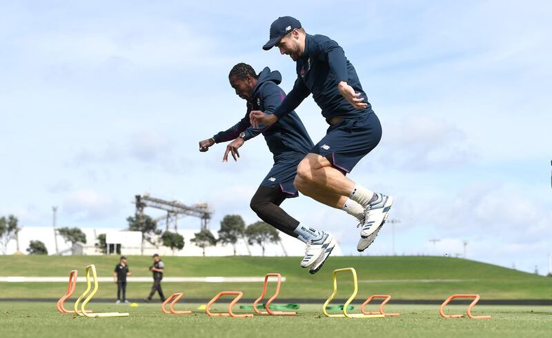 Jofra Archer, left, and Chris Woakes. Getty