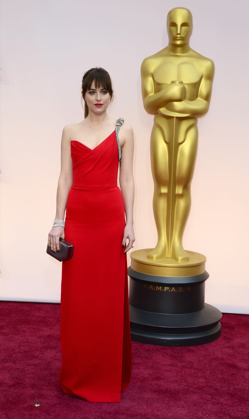 Dakota Johnson, in Saint Laurent, arrives for the 87th annual Academy Awards at the Dolby Theatre in Hollywood, California, on February 22, 2015. EPA