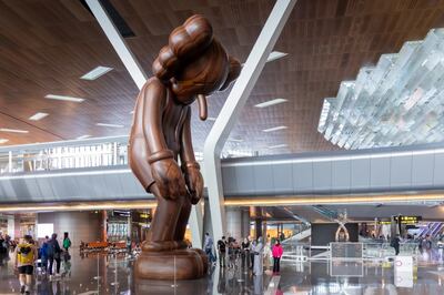 Kaws already has work installed in the country, including 'Small Lie' seen here at the main airport in Doha. Photo: Qatar Museums