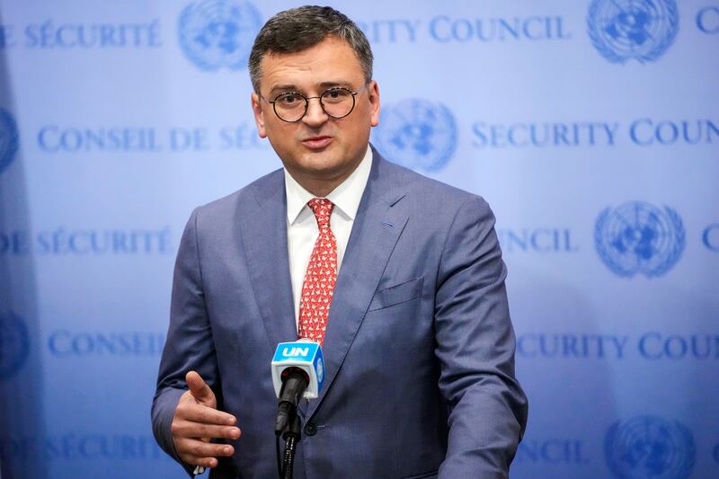 Ukrainian Foreign Minister Dmytro Kuleba speaks to reporters before attending a Security Council meeting on the situation in his country. AP