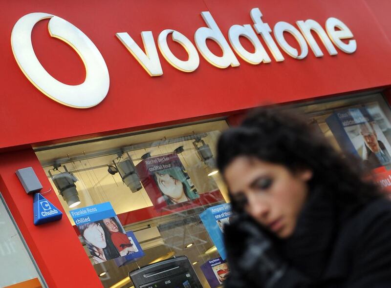 A Vodafone store in London. The company says it must tackle debt and invest more. EPA