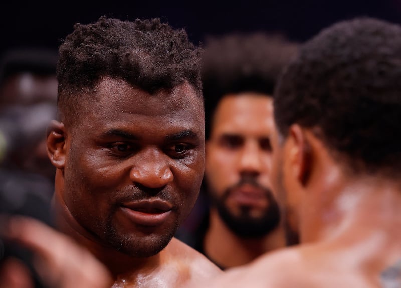 Francis Ngannou speaks with Anthony Joshua after their bout in Riyadh. Reuters