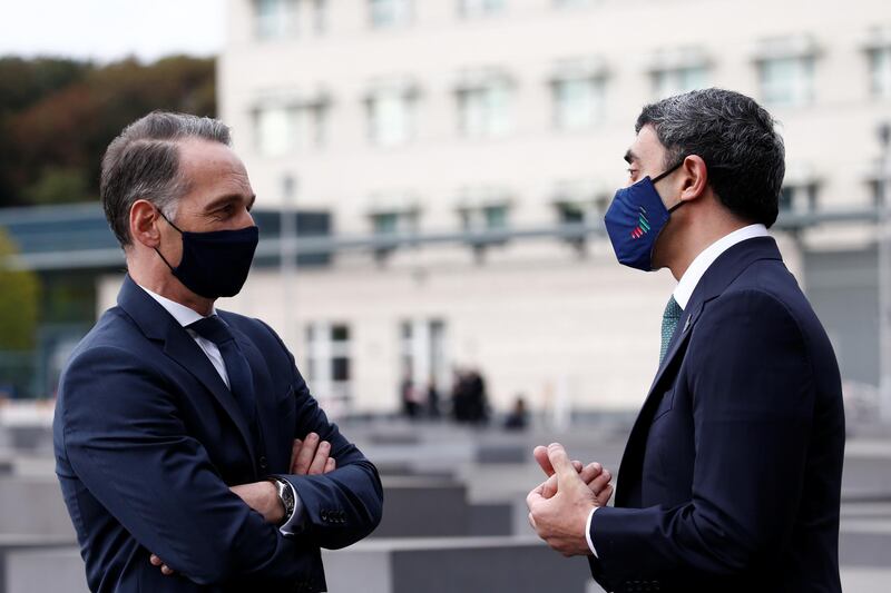 Sheikh Abdullah bin Zayed talks with with German Foreign Minister Heiko Maas as he and his Israeli counterpart Gabi Ashkenazi visit the Holocaust memorial together prior to their historic meeting in Berlin, Germany.  Reuters