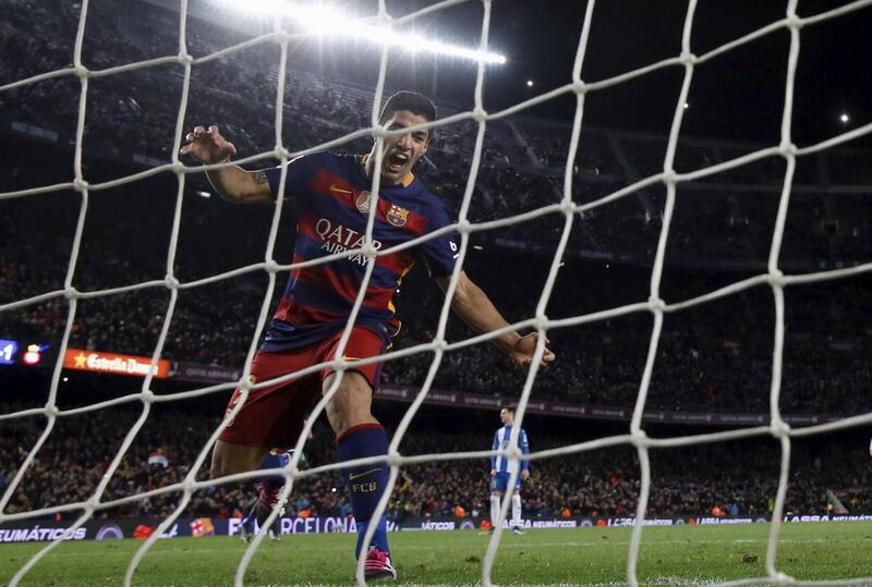 Barcelona’s Luis Suarez celebrates a goal against Espanyol. REUTERS/Albert Gea