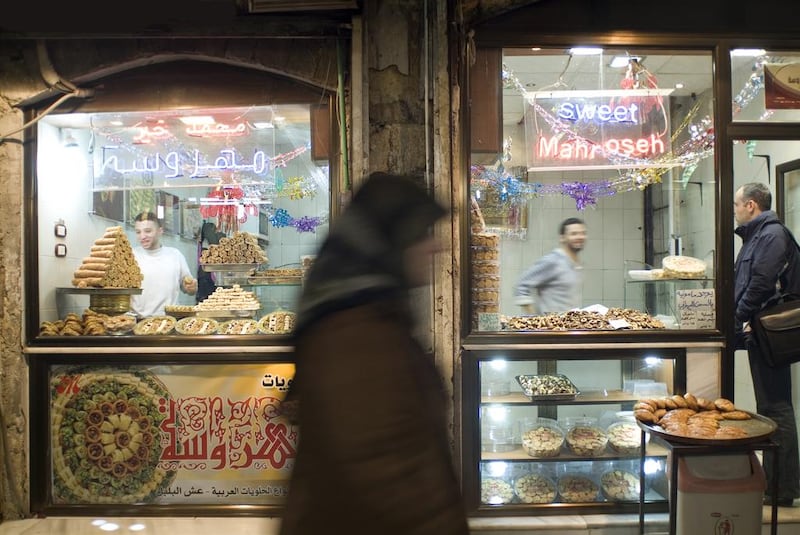 A sweet shop inside Al Madina Souk in Aleppo, Syria, before it was destroyed during the civil war. Getty Images