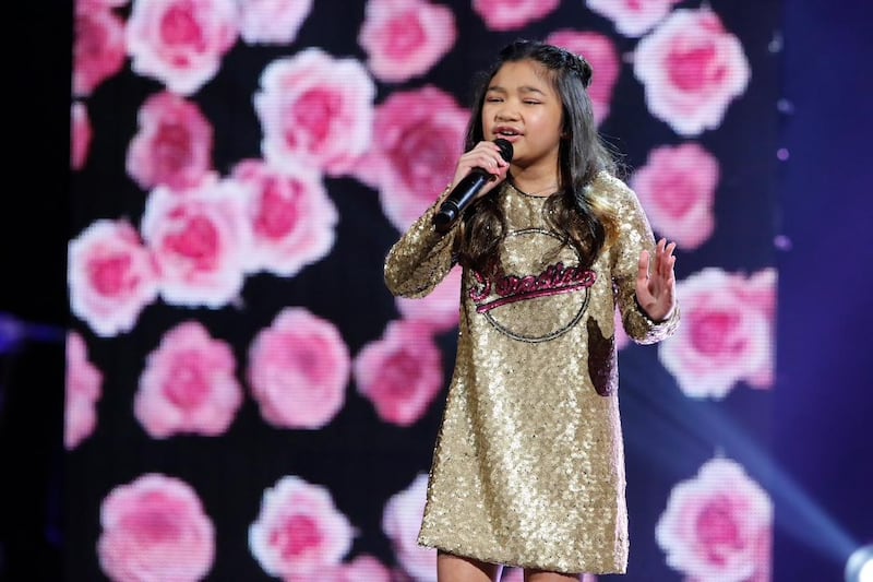 Angelica Hale on the grand final of America's Got Talent. Trae Patton NBC