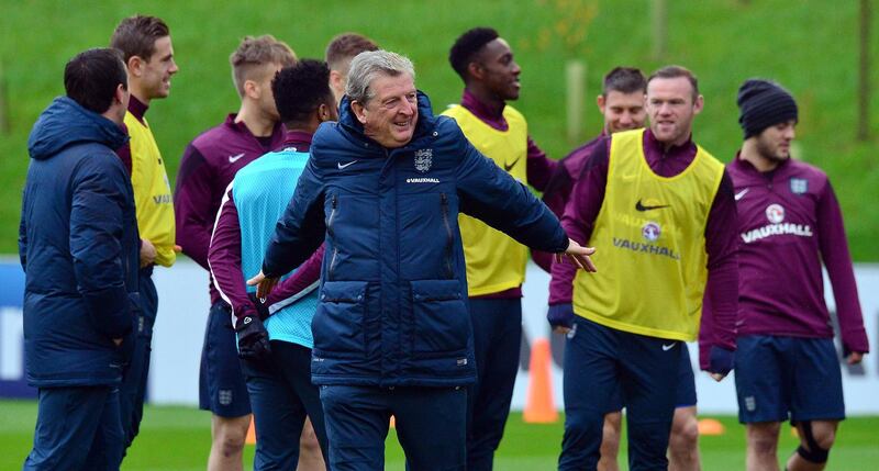 England manager Roy Hodgson (C) takes part in a training session at St George's Park near Burton-on-Trent, central England, on November 14, 2014, on the eve of their Euro 2016 qualifying match against Slovenia at Wembley Stadium on November 15, 2014. AFP PHOTO/PAUL ELLIS
NOT FOR MARKETING OR ADVERTISING USE / RESTRICTED TO EDITORIAL USE / AFP PHOTO / PAUL ELLIS