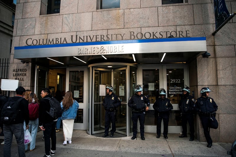 Police stand guard at an entrance to Columbia University, in New York City, where students continue to protest in support of Palestinians, amid the war in Gaza. Reuters
