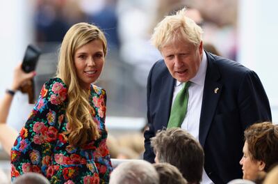 British Prime Minister Boris Johnson and his wife Carrie arrive to attend the Platinum Party at Buckingham Palace on June 4 as part of Queen Elizabeth II's platinum jubilee celebrations. AFP