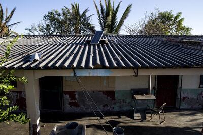 A solar panel sits on the roof of a home in the town of Cachimbo, Oaxaca state, Mexico, on Wednesday, Feb. 14, 2018. Under a program, known as Barefoot College in Tilonia, India, designed to empower poor rural communities around the world, local women from Cachimbo went to India for six months to be trained as electrical technicians. They returned to install dozens of solar panels, battery packs and wiring that now run lights and appliances all over the village. Photographer: Yael Martinez/Bloomberg