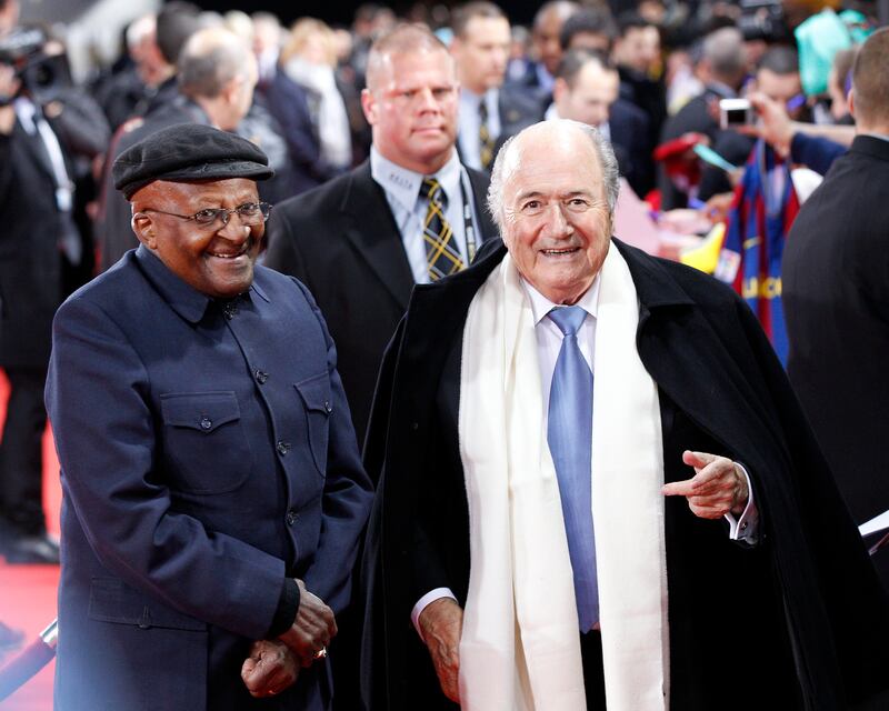 With former Fifa president Joseph Blatter in Zurich, Switzerland. Tutu won the Fifa presidential award in 2010. AP