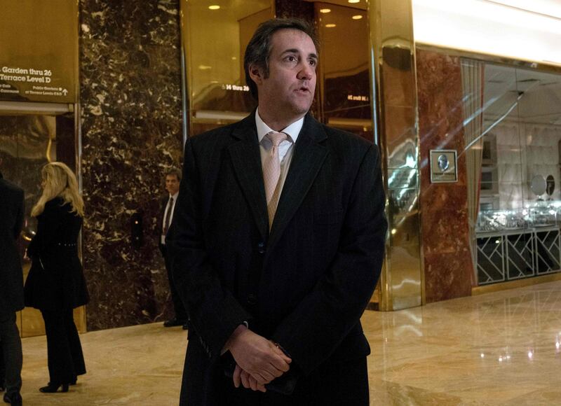 (FILES) In this file photo taken on December 16, 2016 Attorney Michael Cohen arrives at Trump Tower for meetings with President-elect Donald Trump on in New York. 
Federal agents raided the New York offices of US President Donald Trump's longtime personal lawyer Michael Cohen on Monday, Cohen's own attorney Stephen Ryan said, adding the action was taken in part on behalf of Special Counsel Robert Mueller, who is investigating links between Russia and the Trump campaign.
 / AFP PHOTO / Bryan R. Smith
