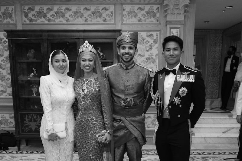 Princess Fadzilah of Brunei and her new husband Abdullah Nabil Mahmoud Al-Hashimi, in the centre, in a photo shared on social media by her brother Prince Mateen. All photos: Prince Mateen/Instagram