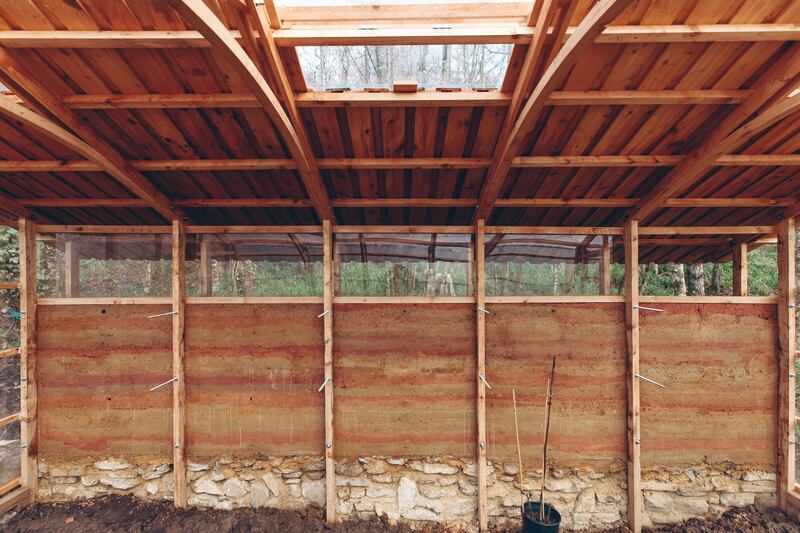 The pavilion uses forest timber and lime instead of cement for more sustainable construction