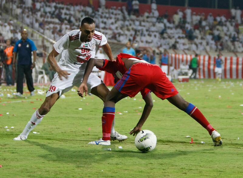 Dubai, United Arab Emirates - September 9, 2012.  Al Sharjah ( number 99 ) against Al Shaab ( number 23 ).  ( Jeffrey E Biteng / The National )
