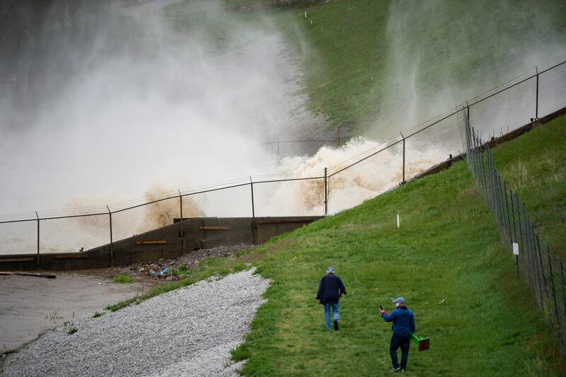 People living along two mid-Michigan lakes and parts of a river have been evacuated following several days of heavy rain. The Bay City Times via AP