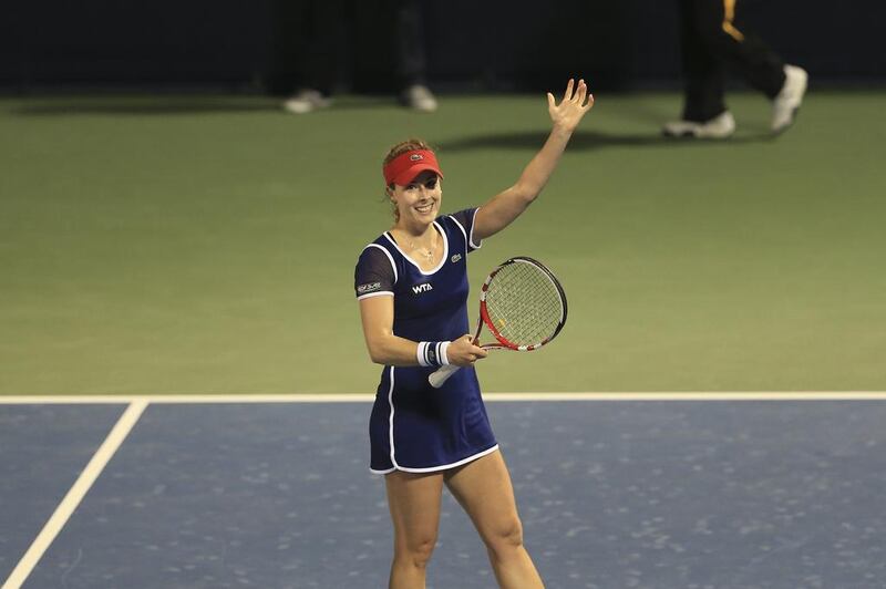 French player Alize Cornet gestures to the crowd after beating Belgian player Kirsten Flipkens in a Dubai Duty Free Tennis Championships match at Dubai Tennis Stadium on Wednesday. Sarah Dea / The National