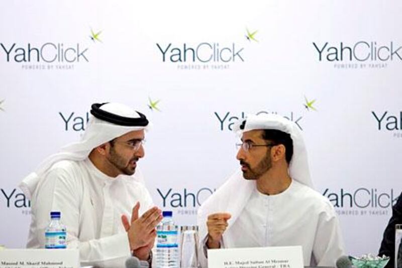 Abu Dhabi, United Arab Emirates, July 1, 2013:    Yahsat Deputy Chief Executive Officer Masood M. Sharif Mahmood, speaks with TRA Acting Director General Majed Sultan Al Mesmar during the YahClick UAE launch at the Yas Viceroy Hotel in Abu Dhabi on July 1, 2013. Christopher Pike / The National