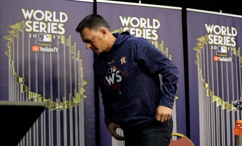 Houston Astros manager A.J. Hinch leaves a World Series baseball news conference, Thursday, Oct. 26, 2017, in Houston, Texas. Houston is set to face the Los Angeles Angels in Game 3, Friday. (AP Photo/Eric Gay)