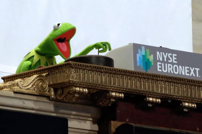 Muppet Kermit the Frog rings the the New York Stock Exchange opening bell, to promote his new movie “Muppets Most Wanted.”. Richard Drew / AP Photo