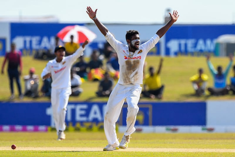 Sri Lanka's Ramesh Mendis after taking the wicket of Pakistan's Fawad Alam at the Galle International Stadium. AFP