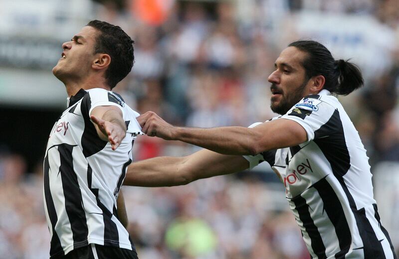 Newcastle's French footballer Hatem Ben Arfa (L) celebrates scoring his team's equaliser against Aston Villa with team-mate Jonas Gutierrrez (L) during the English Premier League football match between Newcastle United and Aston Villa at the Sports Direct Stadium in Newcastle, northern England, on September 2, 2012. AFP PHOTO/LINDSEY PARNABY
RESTRICTED TO EDITORIAL USE. No use with unauthorized audio, video, data, fixture lists, club/league logos or live services. Online in-match use limited to 45 images, no video emulation. No use in betting, games or single club/league/player publications.
 *** Local Caption ***  367686-01-08.jpg