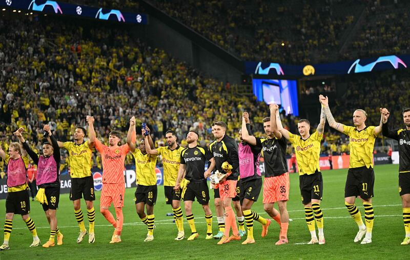 Dortmund players applaud the fans after beating PSG in the Champions League semi-final first leg. AFP