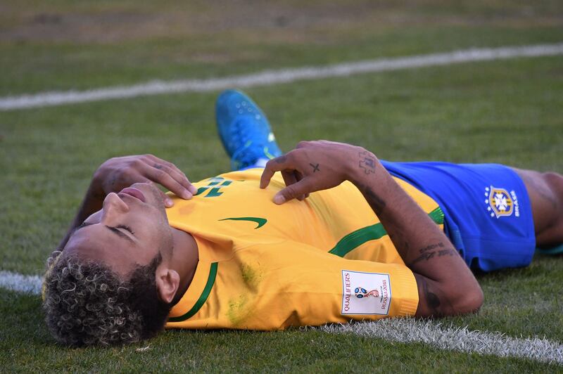 Brazil forward Neymar lies flat on his back during the 2018 World Cup qualifier against Bolivia. Nelson Almeida / AFP