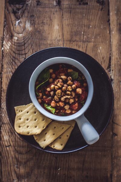 Chickpea, tomato and spinach stew with crispy chickpea croutons. Photo by Scott Price 