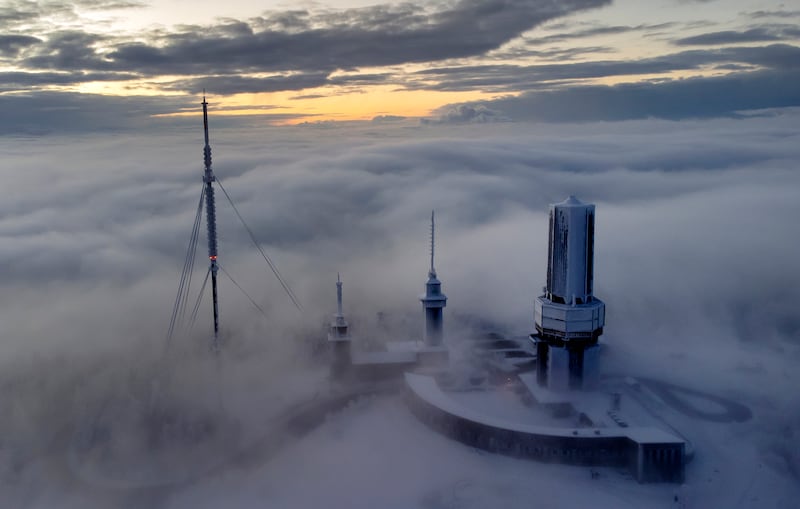 The top of the Feldberg mountain is surrounded by fog and clouds near Frankfurt, Germany. AP