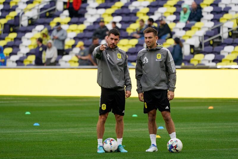 Nashville SC defenders Daniel Lovitz and Taylor Washington admire their new stadium. AP