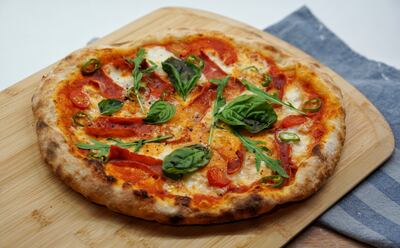 The pizza was created for the Queen Consort of Italy Margherita of Savoy in 1889. Photo: Amiral Mirhashemian / Unsplash