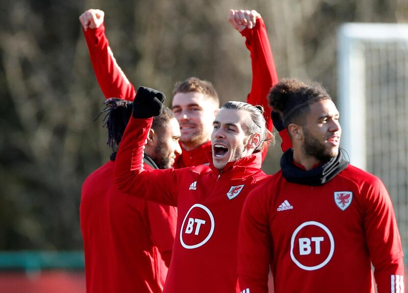 Soccer Football - Euro 2020 Qualifier - Wales Training - The Vale Resort, Hensol, Wales, Britain - November 18, 2019   Wales' Sam Vokes, Ashley Williams, Gareth Bale and Tyler Roberts during training   Action Images via Reuters/Andrew Boyers