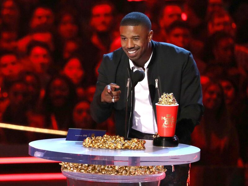 Michael B Jordan accepts the best villain award for 'Black Panther'. AP