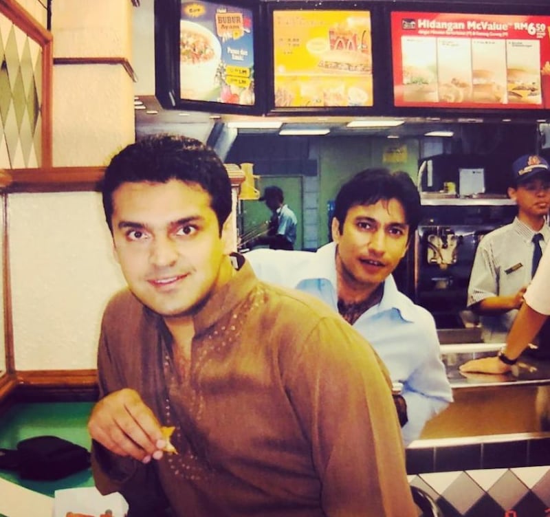 Fakhr-e-Alam with a colleague on a shooting set for a TV series in Malaysia in 2005. 