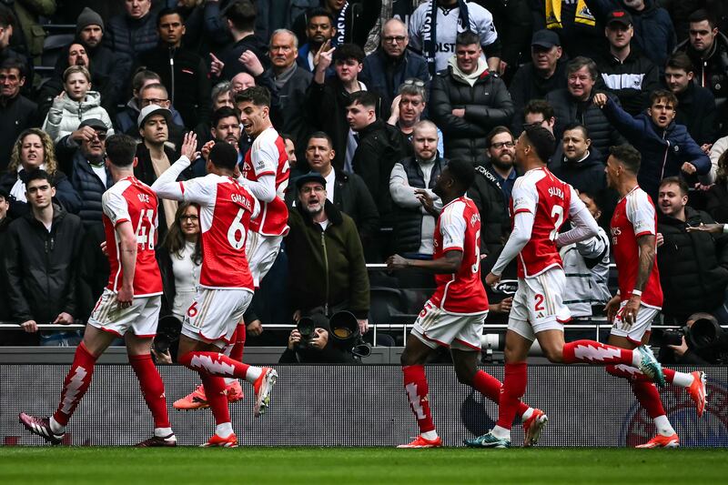 Arsenal's Kai Havertz celebrates with teammates after scoring their third goal. AFP