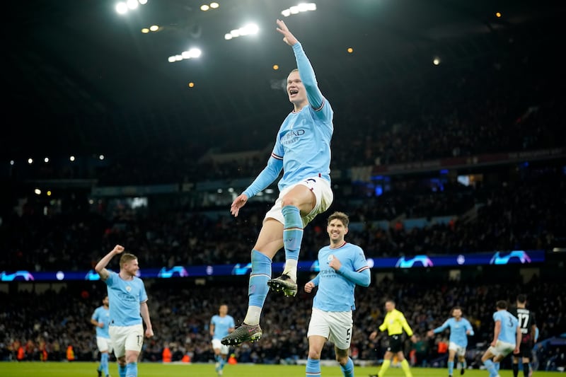 Erling Haaland celebrates after scoring City' fifth goal and his fourth. AP