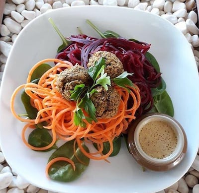 Spiralized carrot and beetroot with bean balls and Asian tang dressing. Courtesy Simple Cafe