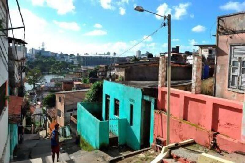 Fonte Nova Arena is seen from a shantytown outside of Salvador in Brazil ahead of the start of the Confederations Cup.  Christophe Simon / AFP