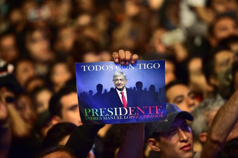 Mr Lopez Obrador rode a wave of popular anger over government corruption to become the first self-described leftist elected to the Mexican presidency in four decades. Pedro Pardo/AFP
