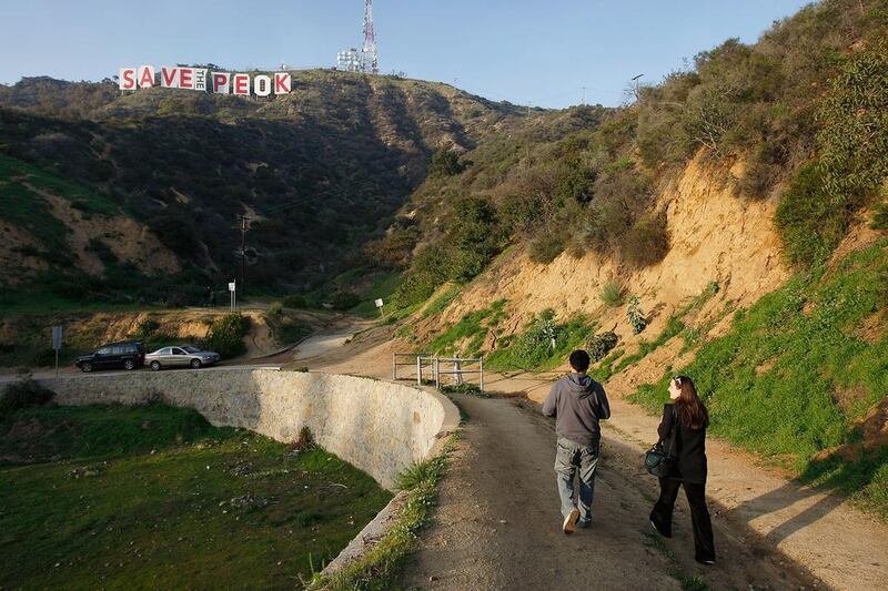 An anti-urbanisation slogan on the Hollywood sign. Anne Cusack / Los Angeles Times via Getty Images