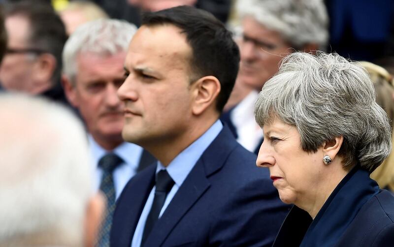 FILE PHOTO: British Prime Minister Theresa May and Irish Prime Minister (Taoiseach) Leo Varadkar attend the funeral of journalist Lyra McKee at St. Anne's Cathedral in Belfast, Northern Ireland, April 24, 2019. REUTERS/Clodagh Kilcoyne/File Photo