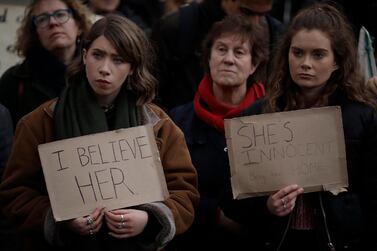 Protesters in London listen to a speech at the demonstration. AP