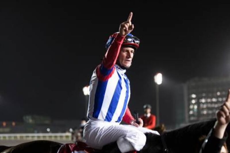 DUBAI, UNITED ARAB EMIRATES – March 26, 2011:  Jockey Mirco Demuro celebrates a victory in the Dubai World Cup on Japanese horse Victoire Pisa, #6, at Meydan Racecourse on Saturday March 26, 2011. ( Andrew Henderson / The National )
