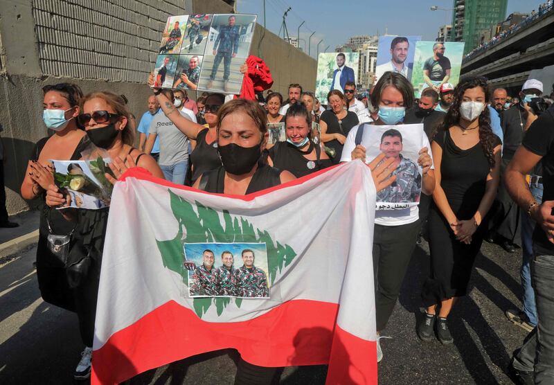 Relatives of the Beirut port blast victims arrive for a remembrance ceremony at the Lebanese capital’s port.